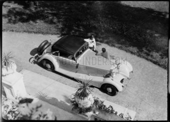 Mercedes-Benz 380 Cabriolet A convertible in a garden scene  1934.