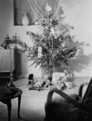 Christmas tree and presents  c 1955.