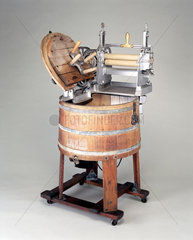 Wooden electrically-driven domestic washing machine  c 1920.