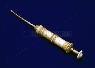 Ivory Piston-action syringe  European  c 1701-1730.
