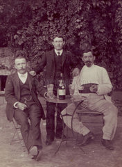Three absinthe drinkers  c 1910.