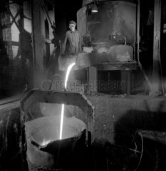 Pouring molten metal from cupola  Widnes foundry  1962.