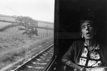 Woman asleep on a train  c 1967.