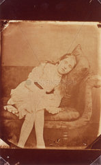 Leila Campbell Taylor seated on a settee  October 1879.