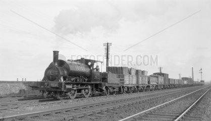 NBR steam locomotive hauling freight  c 1900s.