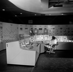 The main control room of Dungeness nuclear power station with operators.