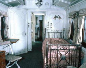 Interior of the Queen's bedroom in the LNWR royal carriage  c 1925.