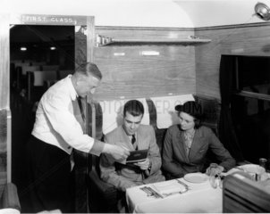 Serving passengers in a LMS dining car  c 1937.