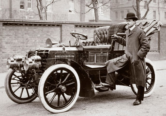 C S Rolls standing beside a 20 hp Panhard motor car  1903