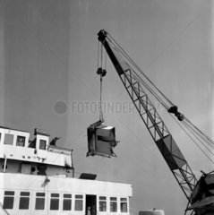 A crane lifts the bridge of the liner Britannic  breakers yard  Inverkeithing.