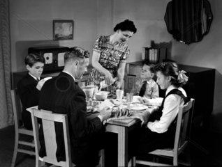 Family at breakfast  c 1948.