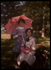Two girls in a garden  1908.