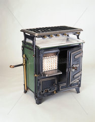 ‘Stimex’ combination gas cooking range  fire and water circulator  c 1922.