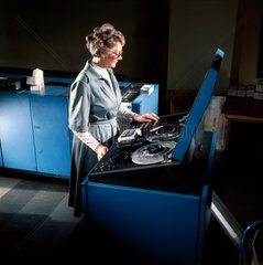 Female operator at computer tape console  Barclaycard  Northampton.