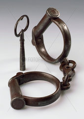 Pair of iron handcuffs  19th century.