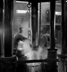 Two men in hammer forge  1954.