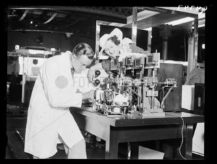 Demonstrating a radio testing device  Radiolympia  London  1934.