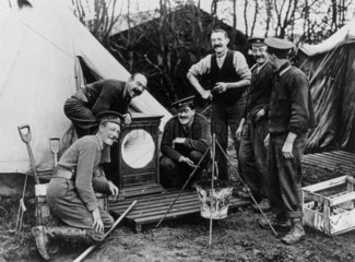 British Soldiers with their Christmas gift of a gramophone  France  1914-1918.