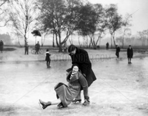 Woman slipping on the ice  Wimbledon  London  27 January 1932.