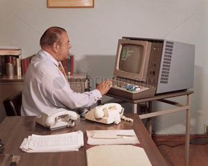 A VDU (Visual Display Unit) being operated at ICL  Stevenage  1975.