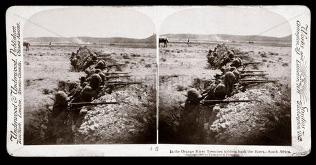 'In the Orange River Trenches holding back the Boers - South Africa’  1900.