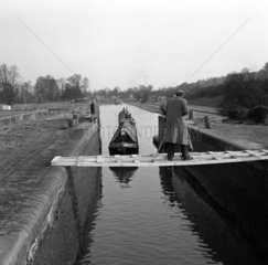 Cameraman filming boats  Slaughter’s Lock  Boxmoor  Hertfordshire  1950.