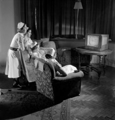Student nurses watch television in lounge  1952.