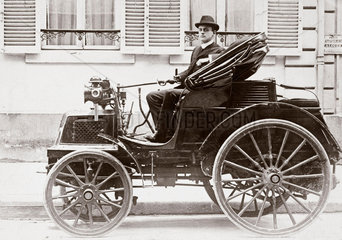 C S Rolls at the wheel of his 8 hp Panhard motor car  France  1898.