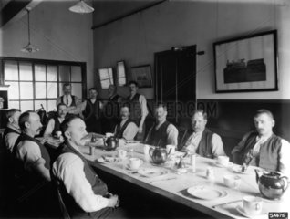 The dining room in the enginemen's hostel at Stratford  East London  c 1911.