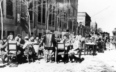 Government militiamen having lunch behind the front lines  Spain  1937.