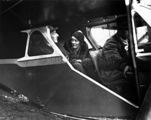 Mr and Mrs Bevin on board a small plane at