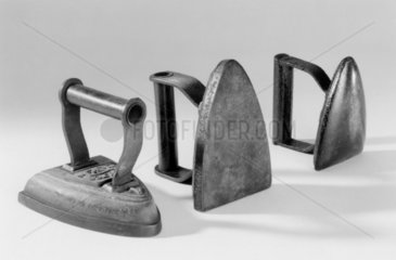 Two flat irons and one goffering iron  c 1850.
