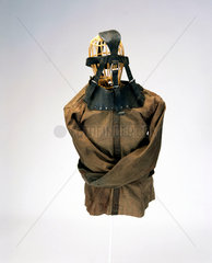 Canvas and leather strait jacket  c 1930.