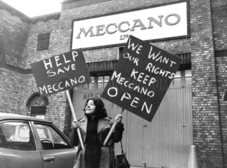 A worker at Meccano carrying placards  December 1979.