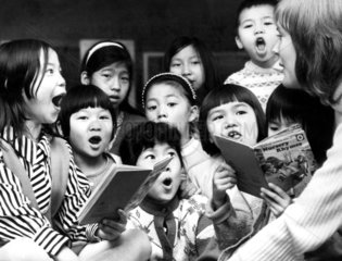 Chinese children learning English in school holidays  Liverpool  August 1971.