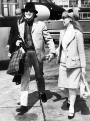 John and Cynthia Lennon  London Airport  1965.