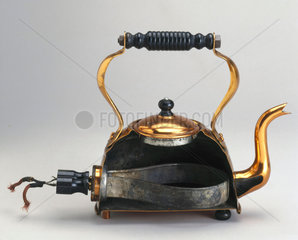Electric copper kettle  with immersed element  sectioned  c 1921.
