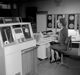 English Electric computer systems  a female progammer at console  1966.