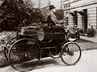 C S Rolls sitting in his first car  1896.