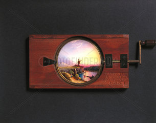 Combined lever and rotary mechanism magic lantern slide  19th century.