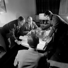 Conference with client  small production and facility company  Soho 1965.
