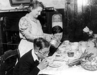 Evacuees enjoying a welcome tea  8 June 194
