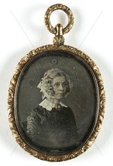 Portrait of a woman contained in a locket  mid-late 19th century.