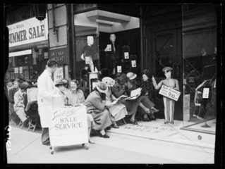 Snacks as the bargain hunters wait  1938.