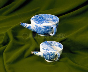 Two feeding cups  English  1820-1880.