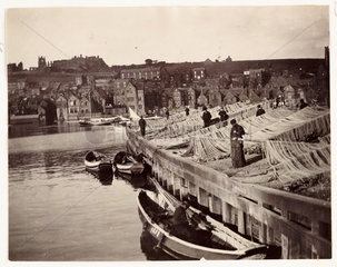 Fishing nets drying at Whitby Harbour  c 1905.