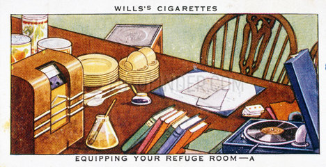 ‘Equipping Your Refuge Room’  Wills cigarette card  1938.
