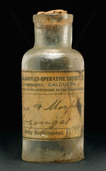 Glass bottle used for ipecacuanha and morphine pills  Indian  1891-1920.