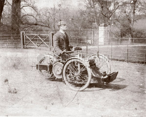 C S Rolls on a 4 hp Bollee Tri-Car  c 1898.