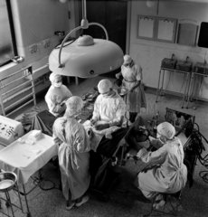 Team at work in operating theatre  1952